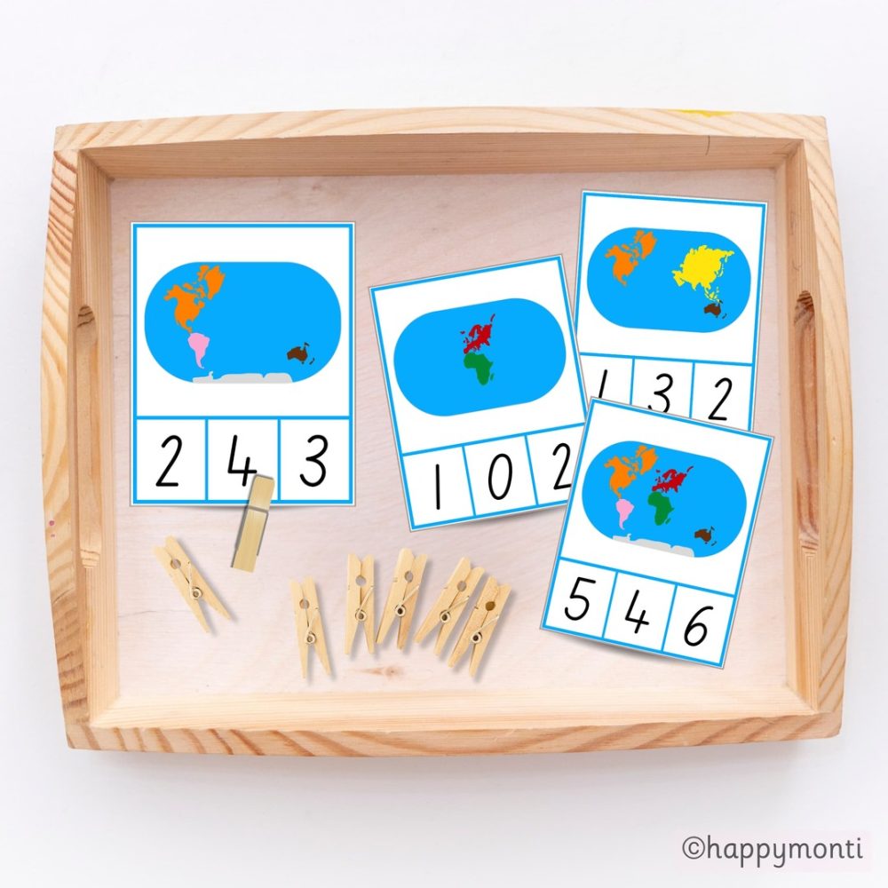 Montessori continent counting cards in a wooden tray with clothespins for matching numbers, designed for preschool counting and geography activities.